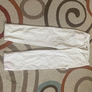 I am selling cream jeans.